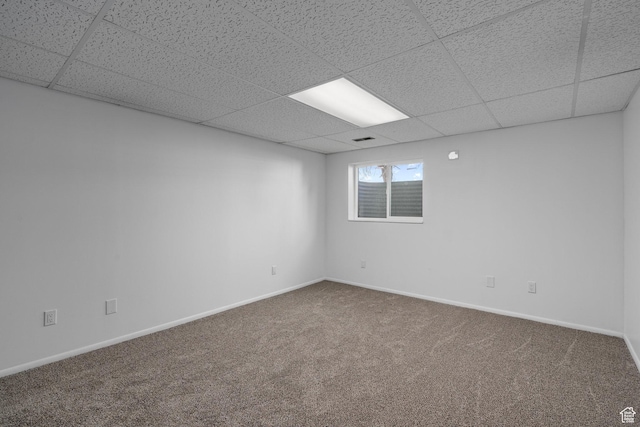 252 W Durfee St, Grantsville, UT 84029 - empty room with carpet flooring, a paneled ceiling, and baseboards