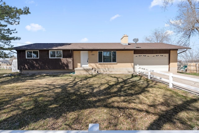 252 W Durfee St, Grantsville, UT 84029 - ranch-style house with a garage, brick siding, a chimney, driveway, and a shingled roof