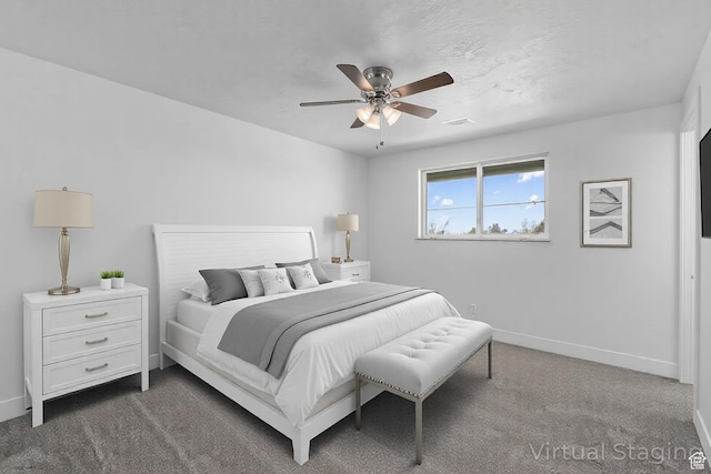 252 W Durfee St, Grantsville, UT 84029 - bedroom with baseboards, dark colored carpet, and ceiling fan