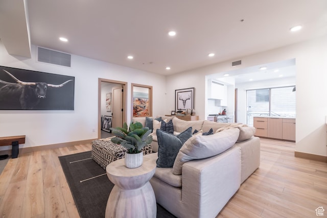 1271 Lowell Ave Unit D201, Park City, UT 84060 - living room featuring light wood finished floors and recessed lighting
