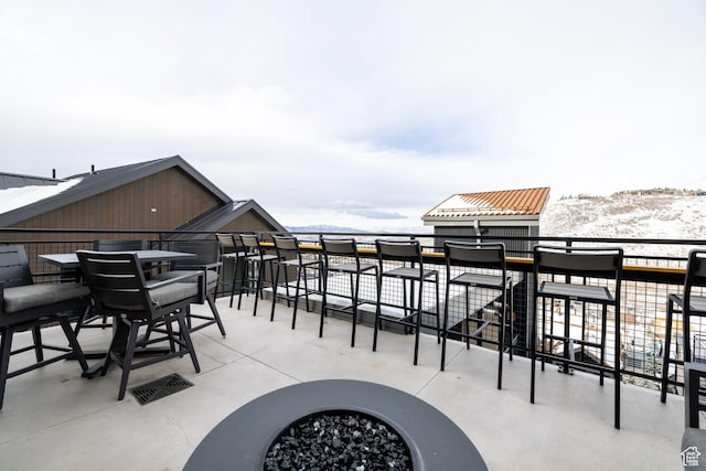 1271 Lowell Ave Unit D201, Park City, UT 84060 - snow covered patio featuring an outdoor fire pit