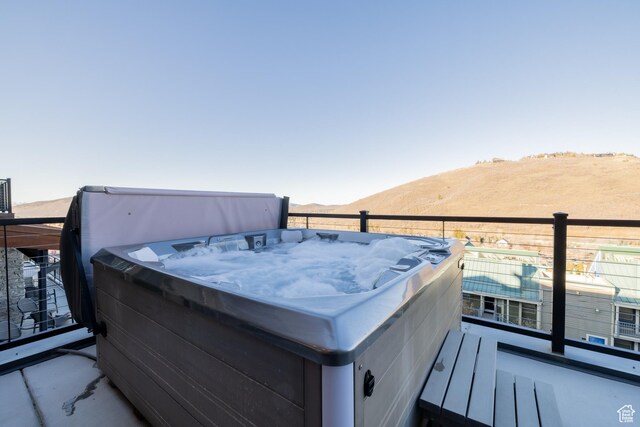 1271 Lowell Ave Unit D201, Park City, UT 84060 - wooden deck with a hot tub and a mountain view