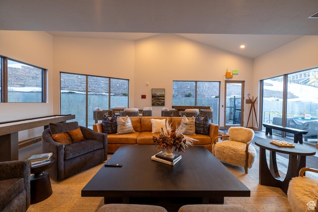 1271 Lowell Ave Unit D201, Park City, UT 84060 - living room featuring light colored carpet, vaulted ceiling, and recessed lighting