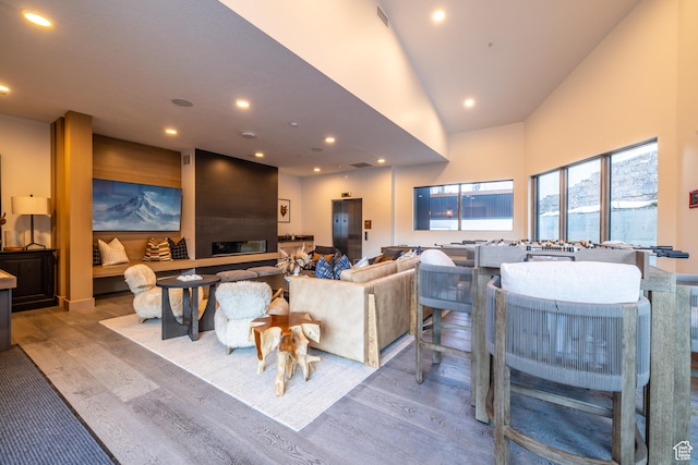 1271 Lowell Ave Unit D201, Park City, UT 84060 - living room with wood finished floors, recessed lighting, elevator, and a high ceiling