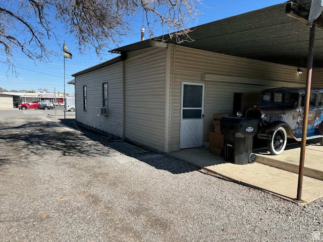 55 W Main St, Grantsville, UT 84029 - view of side of property with an attached carport