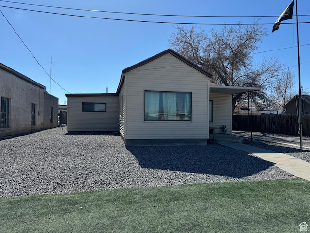 55 W Main St, Grantsville, UT 84029 - rear view of property with fence