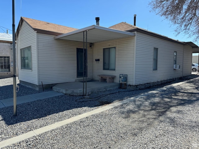 55 W Main St, Grantsville, UT 84029 - view of front of home featuring cooling unit