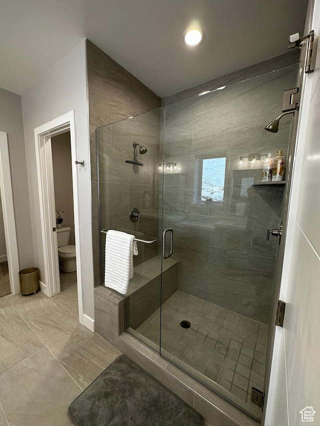 818 E Miner Way Unit 34, Hideout, UT 84036 - bathroom with a stall shower, baseboards, and toilet