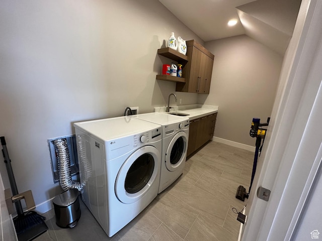 818 E Miner Way Unit 34, Hideout, UT 84036 - laundry area featuring a sink, cabinet space, baseboards, and washer and clothes dryer