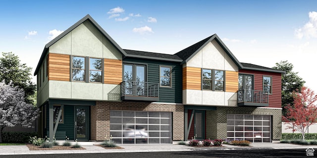 view of front of home with stucco siding, brick siding, and a balcony