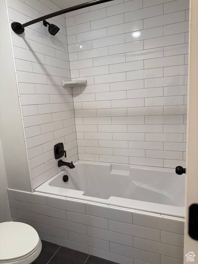 bathroom with  shower combination and toilet