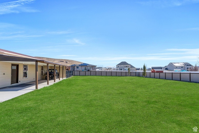 9844 N Faust Station Dr W, Eagle Mountain, UT 84005 - view of yard featuring a patio and a fenced backyard