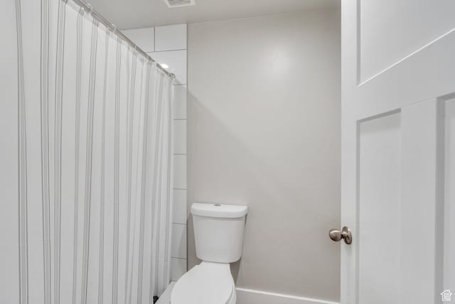 9844 N Faust Station Dr W, Eagle Mountain, UT 84005 - full bath featuring toilet and curtained shower
