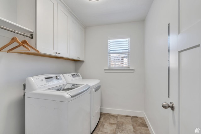 9844 N Faust Station Dr W, Eagle Mountain, UT 84005 - washroom with cabinet space, baseboards, and washer and dryer