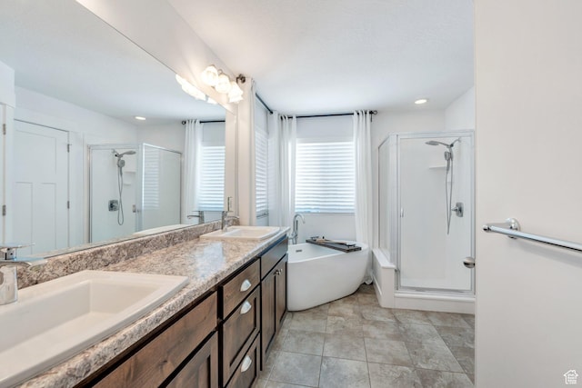 9844 N Faust Station Dr W, Eagle Mountain, UT 84005 - bathroom with a shower stall, double vanity, a bath, and a sink