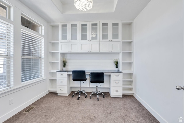 9844 N Faust Station Dr W, Eagle Mountain, UT 84005 - home office featuring baseboards, carpet flooring, visible vents, and built in study area