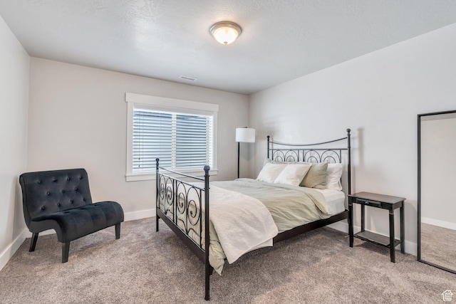 9844 N Faust Station Dr W, Eagle Mountain, UT 84005 - bedroom featuring carpet floors, baseboards, and visible vents