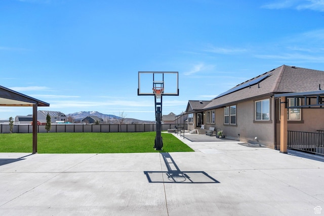 9844 N Faust Station Dr W, Eagle Mountain, UT 84005 - view of patio / terrace with a mountain view and fence