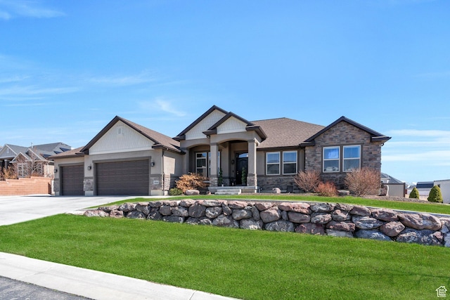 craftsman-style home with concrete driveway, roof with shingles, stone siding, a front lawn, and a garage