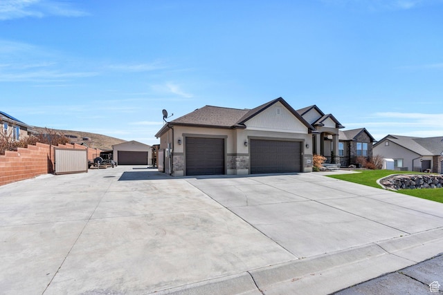 9844 N Faust Station Dr W, Eagle Mountain, UT 84005 - view of front of home with concrete driveway, roof with shingles, fence, an attached garage, and a residential view
