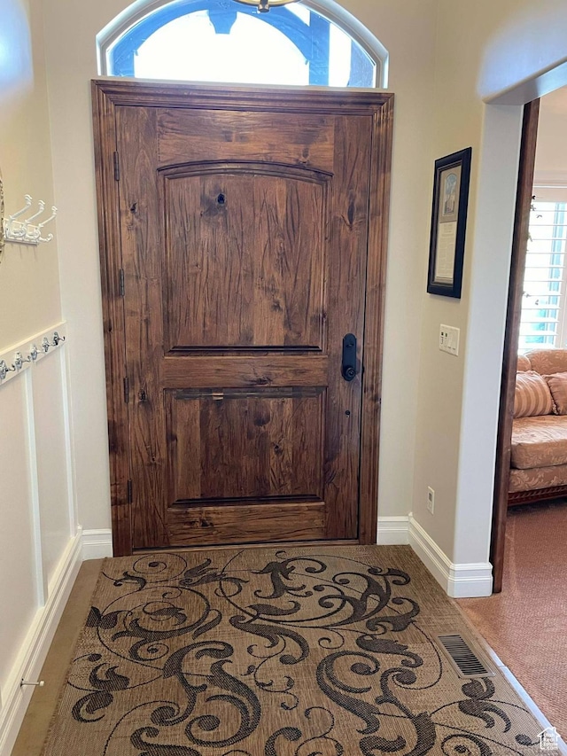 958 S Bridgecreek Ln, Layton, UT 84041 - entryway featuring baseboards and carpet floors