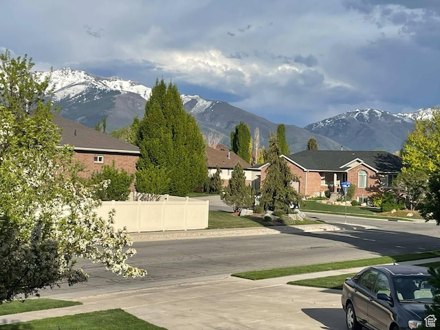 958 S Bridgecreek Ln, Layton, UT 84041 - view of road with a residential view, sidewalks, and a mountain view