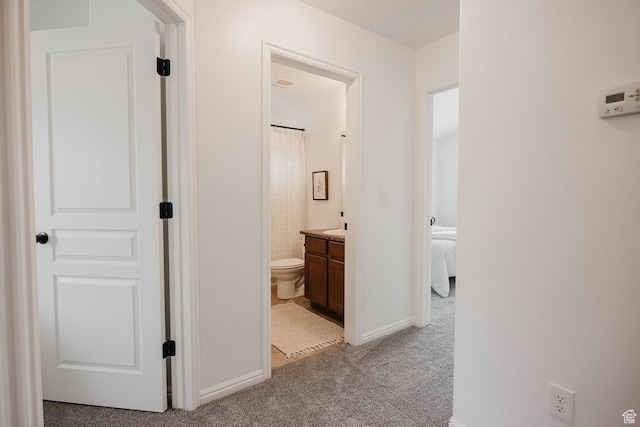 352 S 2000 E, Spanish Fork, UT 84660 - hallway featuring light carpet and baseboards
