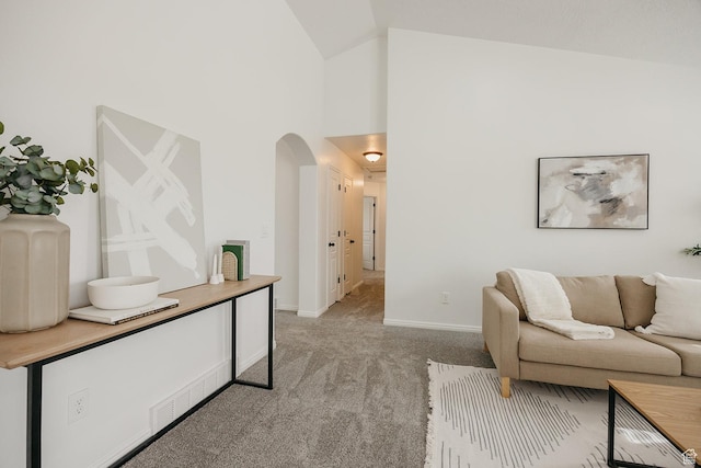 352 S 2000 E, Spanish Fork, UT 84660 - living room featuring light colored carpet, high vaulted ceiling, arched walkways, and baseboards