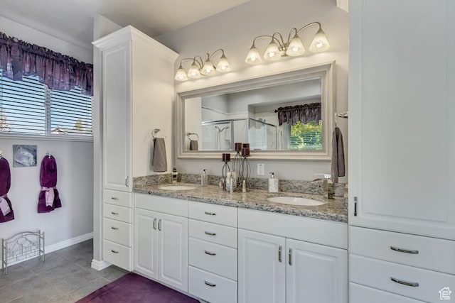 496 E Spruce Glen Rd, Murray, UT 84107 - bathroom with double vanity, a stall shower, plenty of natural light, and tile patterned floors
