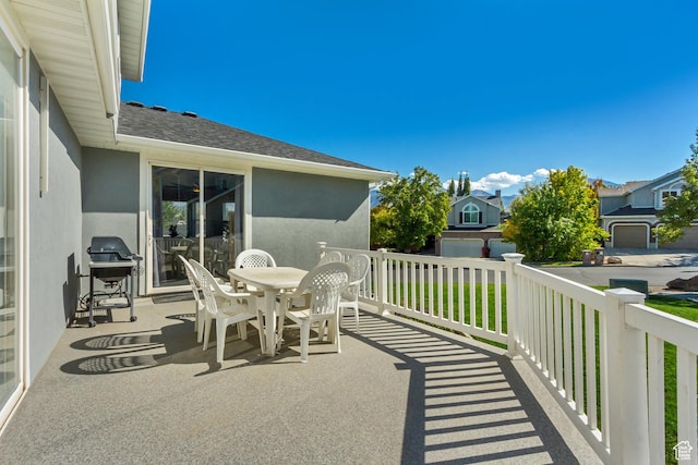 496 E Spruce Glen Rd, Murray, UT 84107 - view of patio featuring outdoor dining area, area for grilling, and a residential view