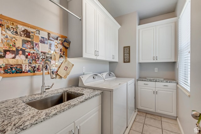496 E Spruce Glen Rd, Murray, UT 84107 - laundry room featuring cabinet space, separate washer and dryer, light tile patterned floors, and baseboards