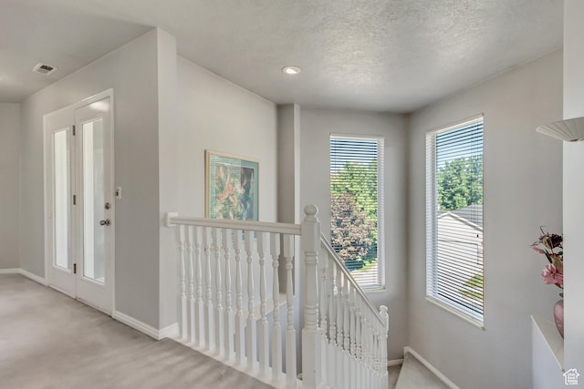 496 E Spruce Glen Rd, Murray, UT 84107 - stairway with baseboards, carpet, and a textured ceiling