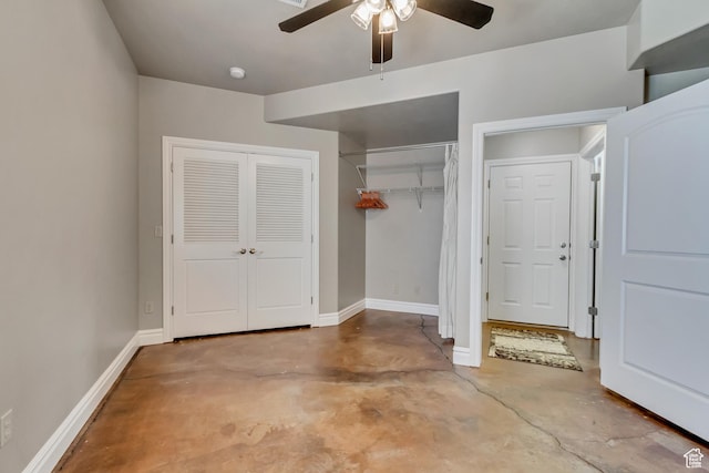 496 E Spruce Glen Rd, Murray, UT 84107 - unfurnished bedroom featuring unfinished concrete flooring, baseboards, a ceiling fan, and a closet