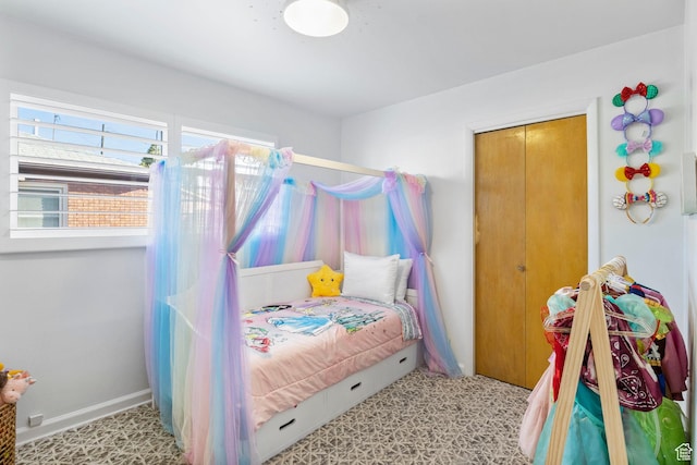 bedroom featuring baseboards