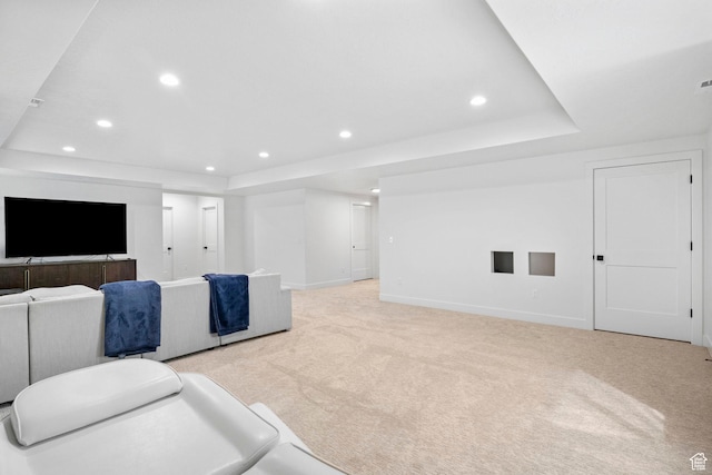 4947 W Evergreen Ln, Highland, UT 84003 - living room featuring a tray ceiling, recessed lighting, and light carpet