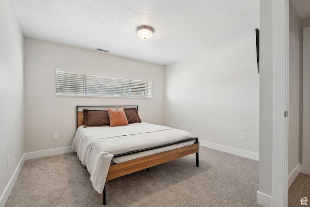 32 E 500 S, Midway, UT 84049 - bedroom featuring carpet floors, baseboards, and a textured ceiling