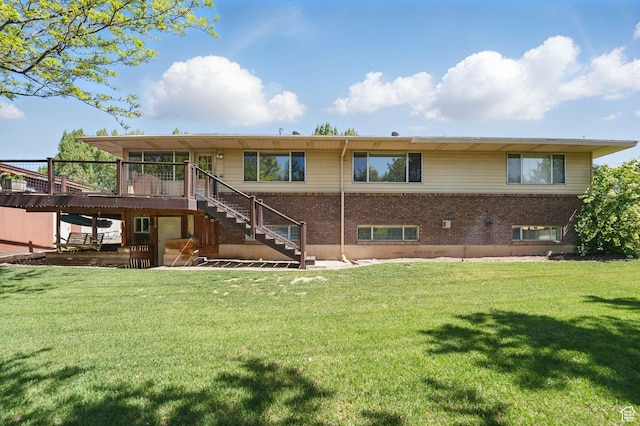 32 E 500 S, Midway, UT 84049 - back of property with stairway, a wooden deck, brick siding, and a lawn