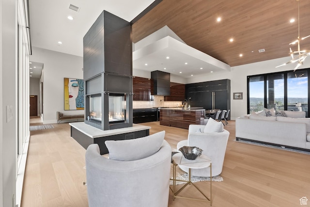 7290 Foxglove Ct, Park City, UT 84098 - living room with recessed lighting, light wood-type flooring, wooden ceiling, baseboards, and visible vents