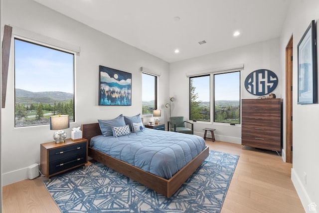 7290 Foxglove Ct, Park City, UT 84098 - bedroom with visible vents, baseboards, light wood finished floors, and recessed lighting