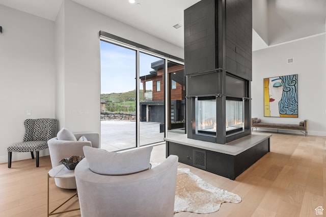 7290 Foxglove Ct, Park City, UT 84098 - living area featuring baseboards, visible vents, and light wood-style flooring