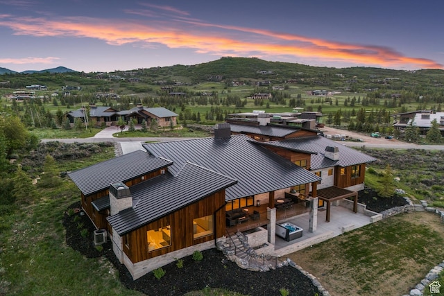 7290 Foxglove Ct, Park City, UT 84098 - aerial view at dusk with a mountain view