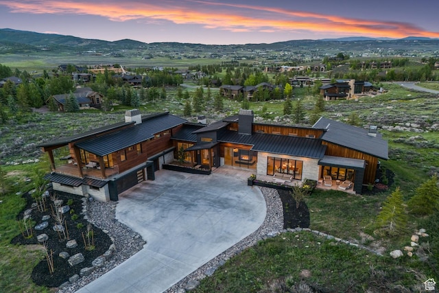 7290 Foxglove Ct, Park City, UT 84098 - aerial view at dusk featuring a mountain view