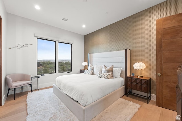 7290 Foxglove Ct, Park City, UT 84098 - bedroom with baseboards, wallpapered walls, and light wood-type flooring