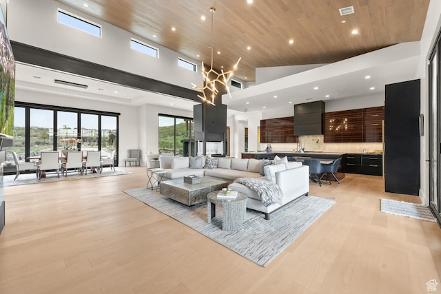 7290 Foxglove Ct, Park City, UT 84098 - living area with recessed lighting, wood ceiling, a towering ceiling, light wood finished floors, and visible vents