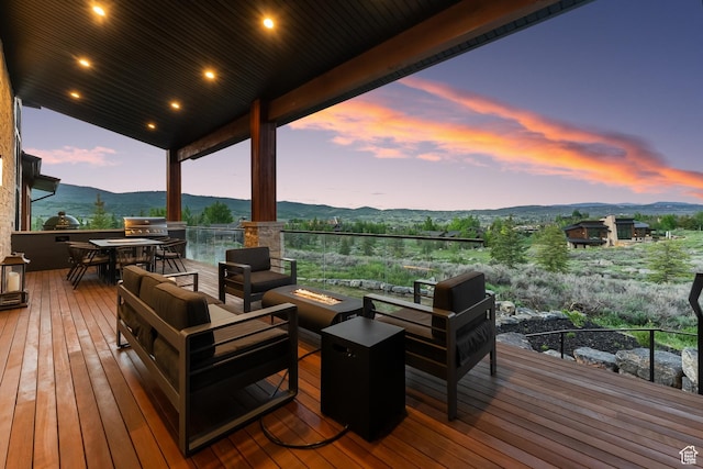 7290 Foxglove Ct, Park City, UT 84098 - deck with an outdoor living space with a fire pit and a mountain view