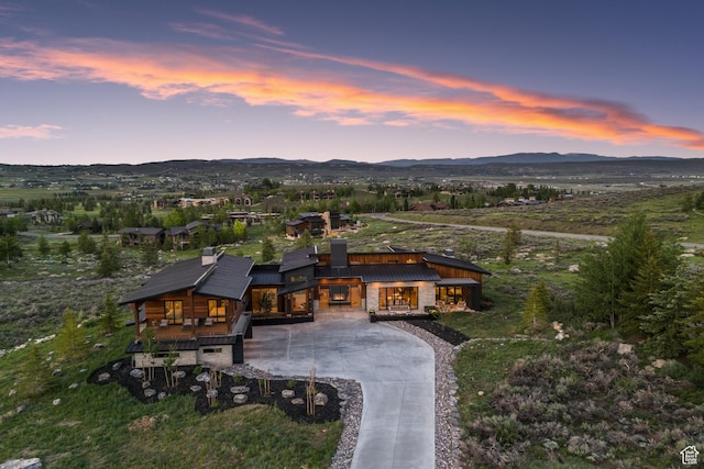 7290 Foxglove Ct, Park City, UT 84098 - aerial view at dusk with a mountain view
