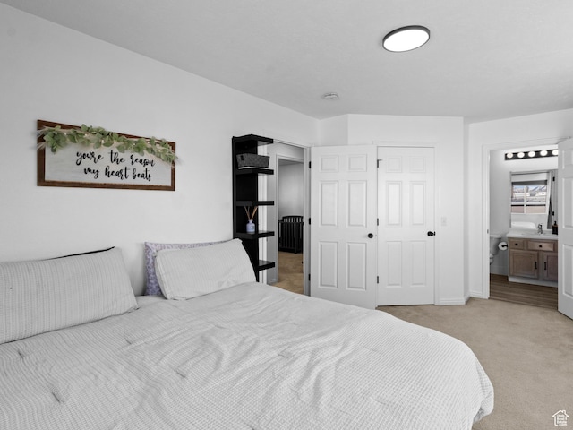 1929 W 680 N, Pleasant Grove, UT 84062 - bedroom with a sink, ensuite bath, baseboards, and light colored carpet