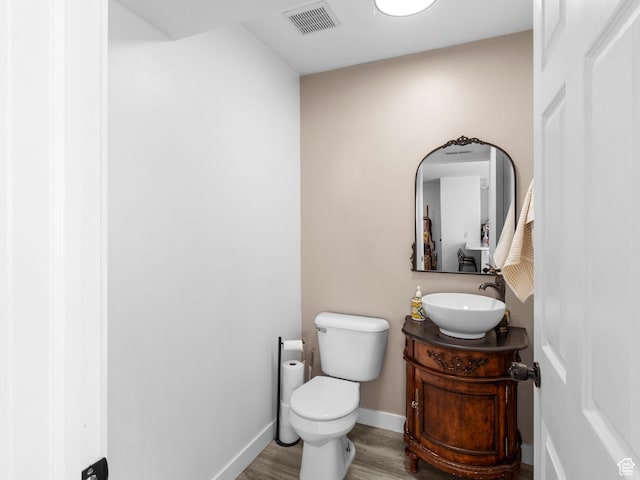 1929 W 680 N, Pleasant Grove, UT 84062 - half bath with toilet, vanity, wood finished floors, baseboards, and visible vents