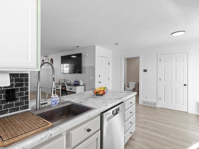 1929 W 680 N, Pleasant Grove, UT 84062 - kitchen with white cabinets, visible vents, light wood finished floors, dishwasher, and light stone counters