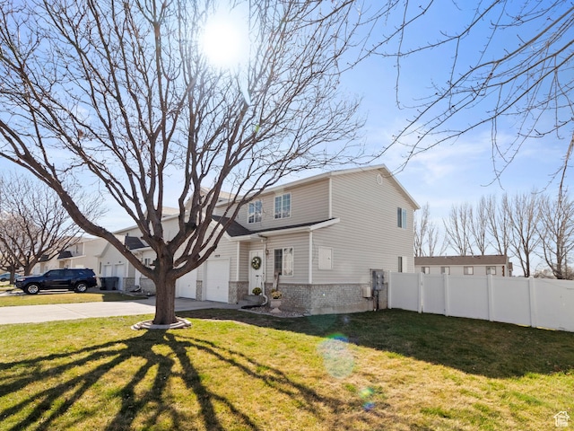 1929 W 680 N, Pleasant Grove, UT 84062 - view of front of house with concrete driveway, an attached garage, fence, brick siding, and a front lawn